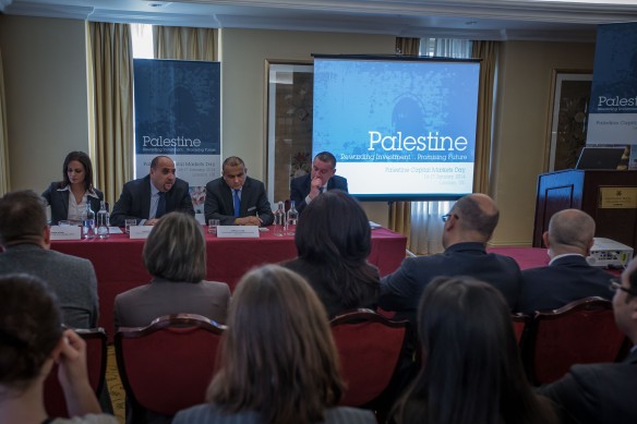The Palestine Delegation to Palestine Capital Markets Day in London, 17 January, 2014.  From left to right:  Fida Musleh-Azar, PEX Manager of Public Relations & Investor Education; PEX   CEO Ahmad Aweidah; Ammar Aker, CEO, PalTel; John Davies, Vice-President, S&P Dow Jones Indices.  Photo:  Mark Green.